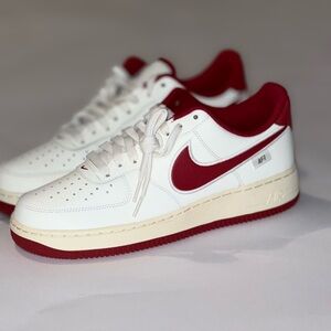 Nike color is “Red Coconut Milk”’ White and Burgundy and cream. Men’s size 8.5